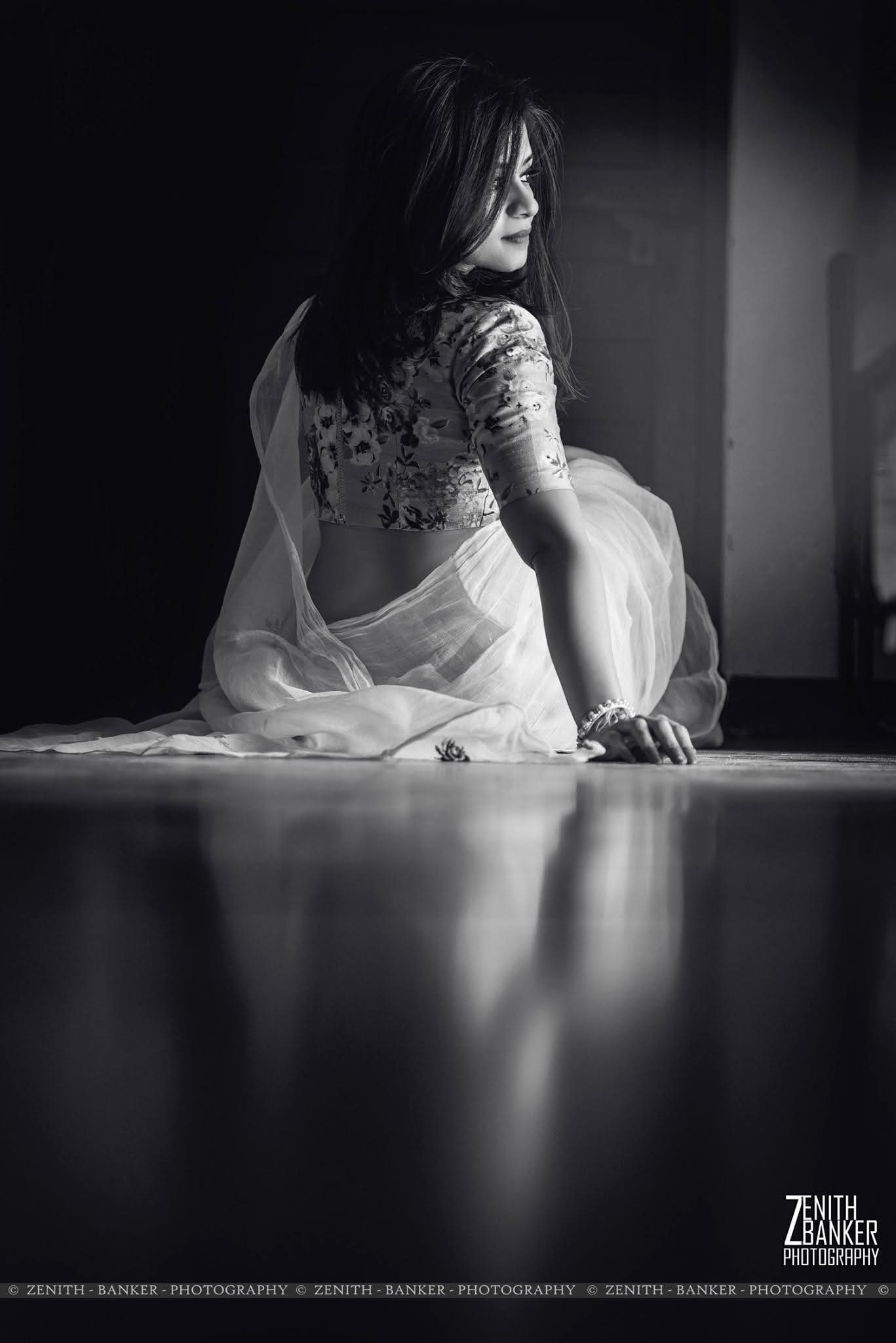 Professional actor headshot of Radhika Barot smiling at the camera for her creative portfolio.