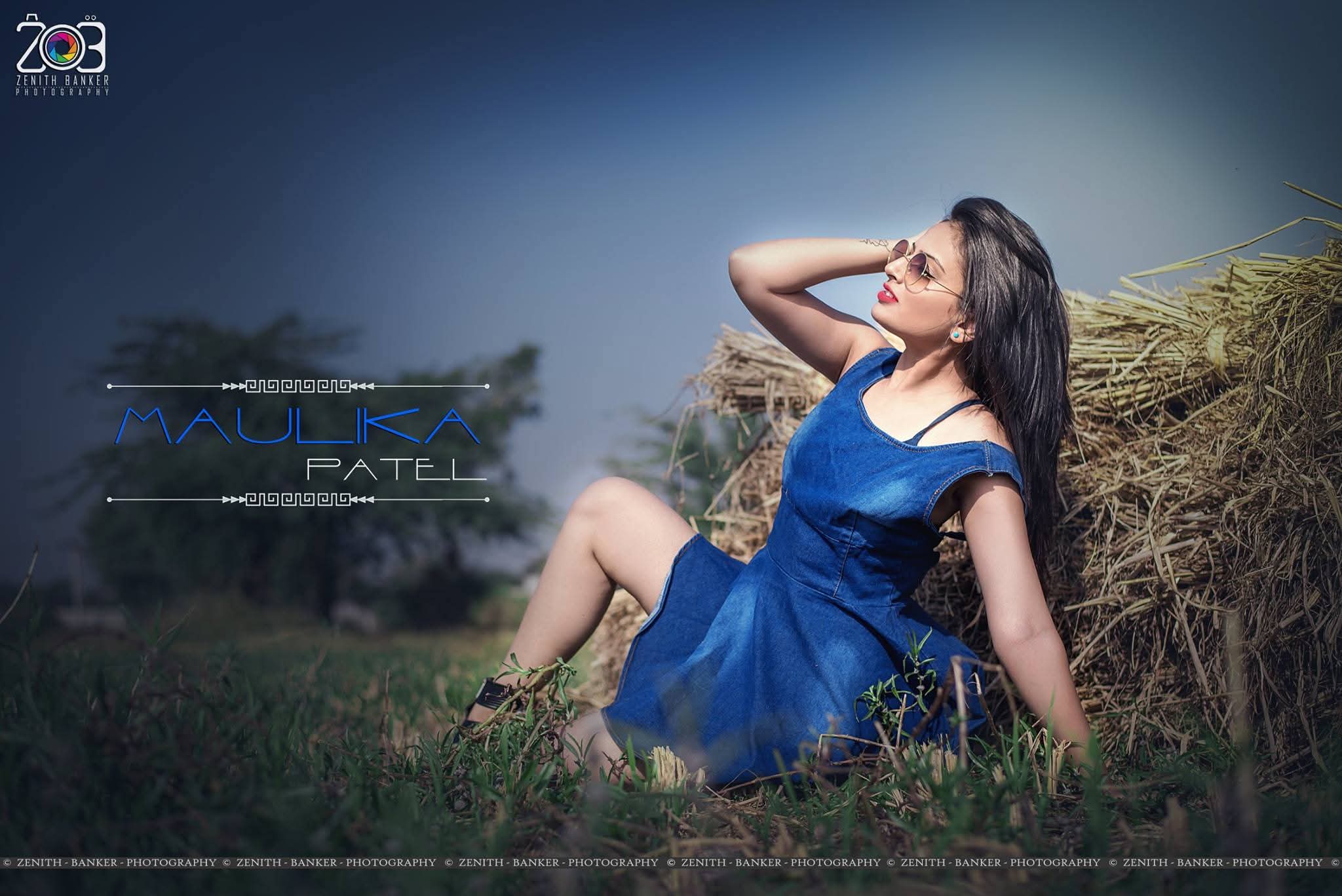 Stylish mid-shot of Maulika Patel posing in a garden setting for a fashion portfolio.