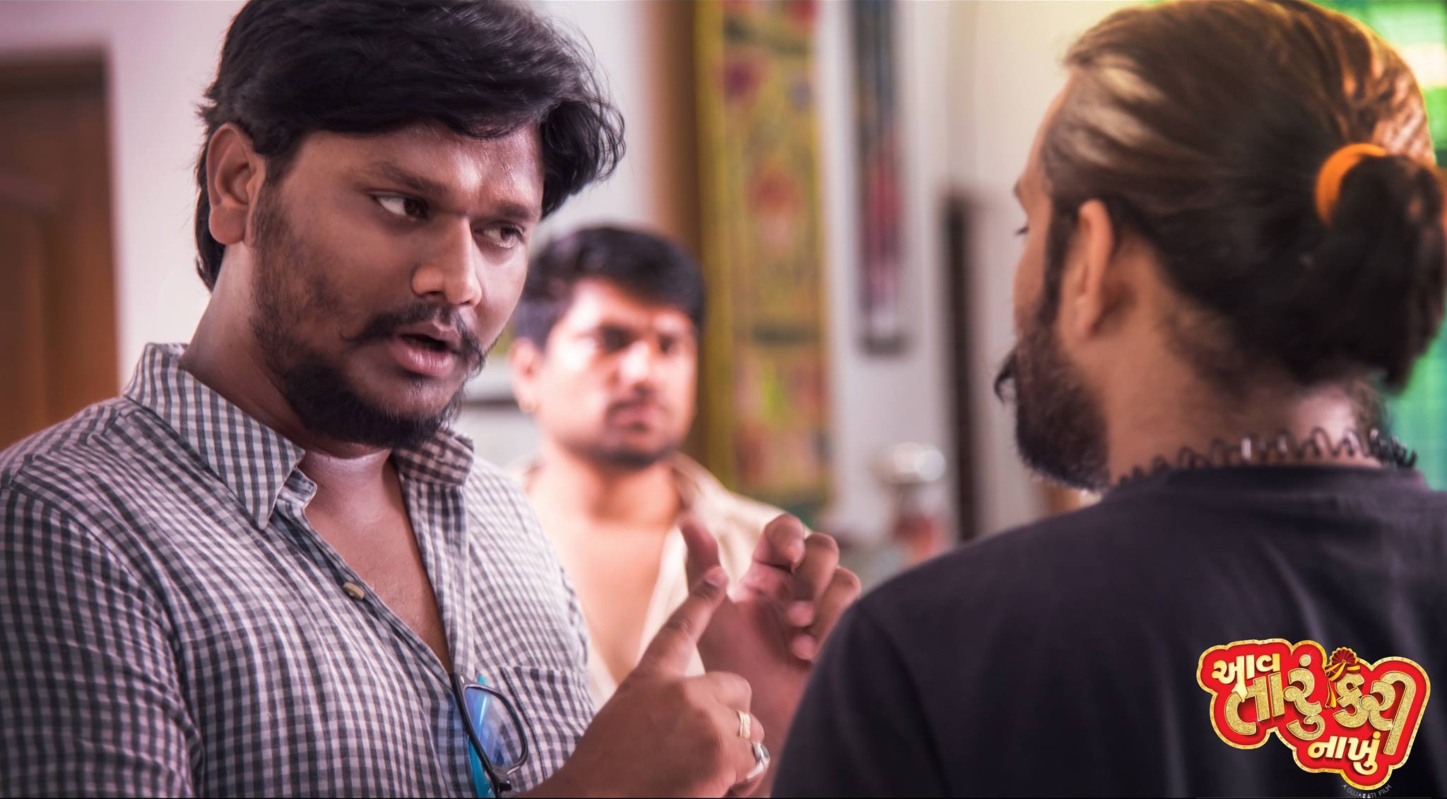 Zenith Banker explaining the creative concept and pose to a client during a shoot.