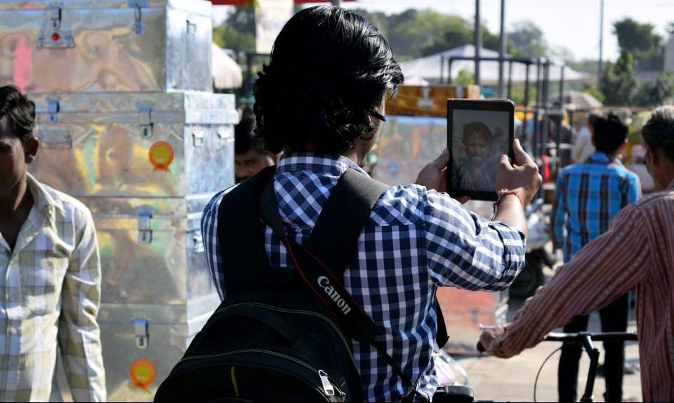 Behind the scenes of Zenith Banker travelling to an outdoor location for a destination shoot.