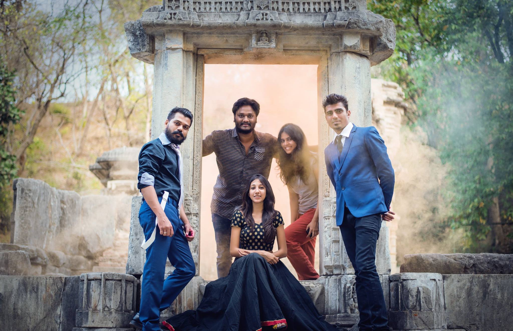 Zenith Banker and photography team posing with a fashion model after a successful portfolio shoot.